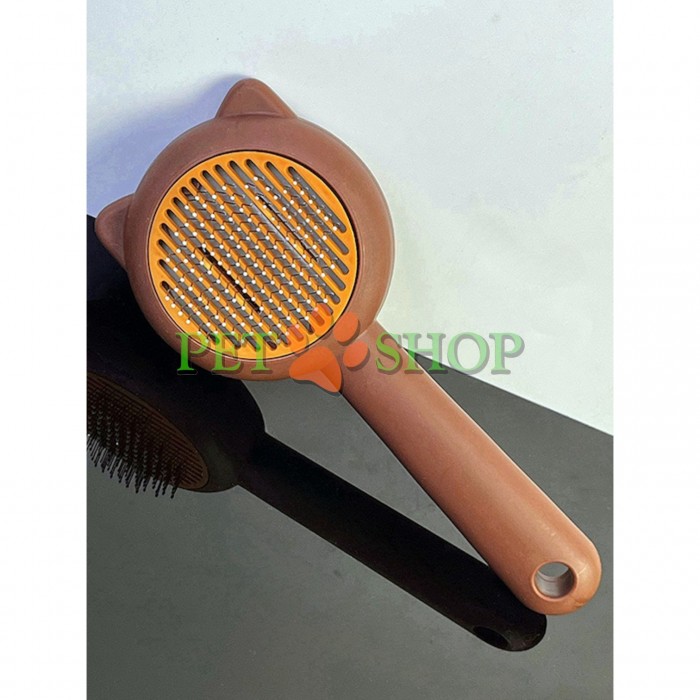 <p>Perie de descurcat cu buton, cu urechiușe.&nbsp;Dimensiuni: 19,5 &times; 8 cm</p>